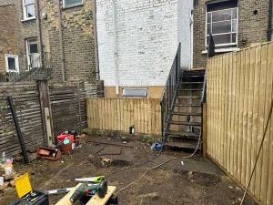 Wooden fence install in London backyard
